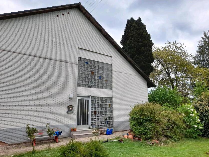 Mehrfamilienhaus freistehend mit großem Grundstück + Ladenlokal