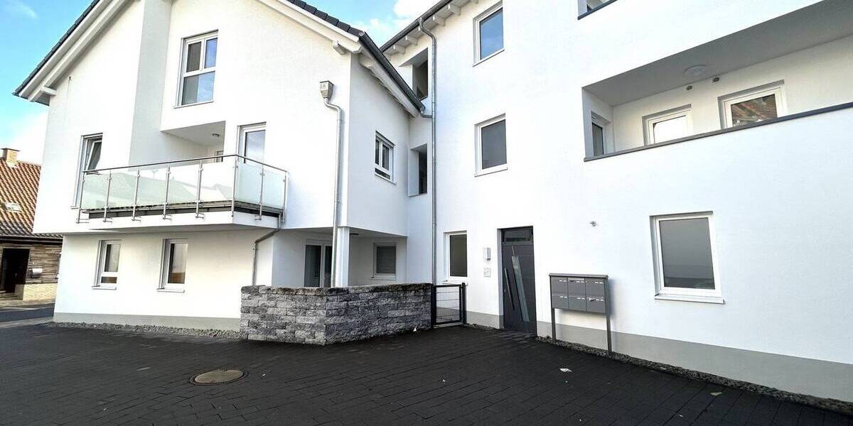 Moderne Eigentumswohnung im 1. OG mit Balkon und zwei Stellplätzen 3 zimmer