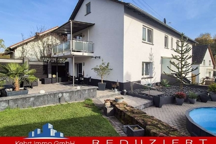 Investmentchance: Großzügiges Zweigenerationen-Wohnen: Poolbereich mit Bar und barrierefreiem EG - Haus Katzweiler | Angebot:27159280