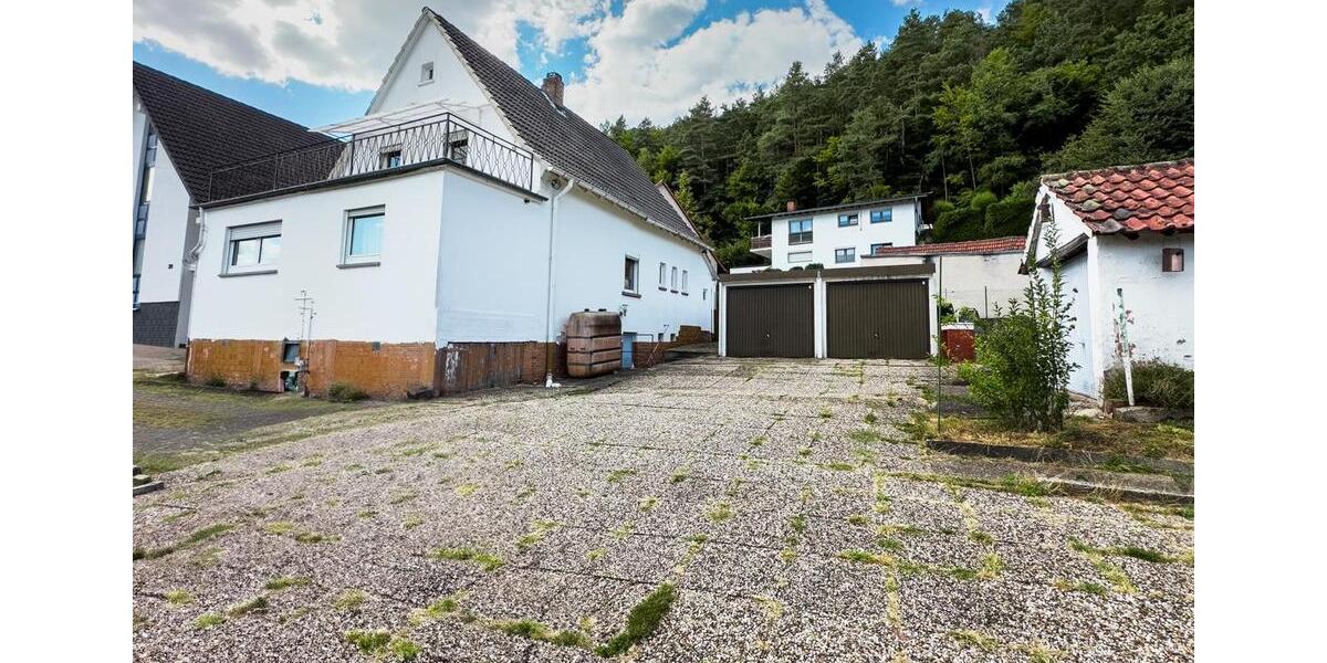 Einfamilienhaus mit Garten und 2 Garagen 6 zimmer